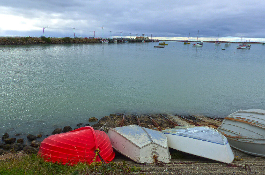 Small boats pulled up on the shore